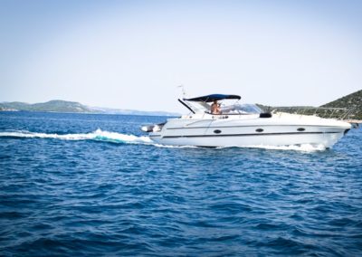 blue-boat-clouds-coast-296278